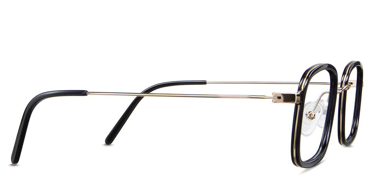 Bevin eyeglasses in the obsidian variant - have a skinny metal temple arm in color gold.