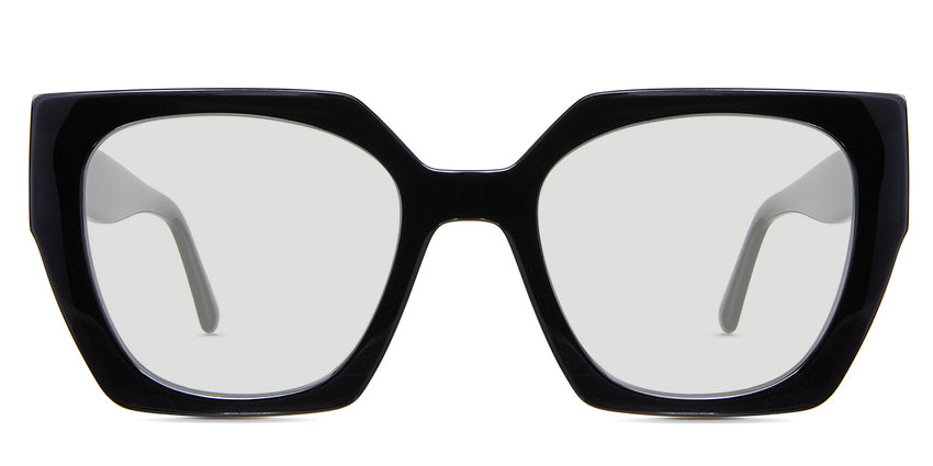 Lenor black tinted Standard Solid in the Midnight variant - it's an oversized frame with a roundish square lens shape and a thick temple.