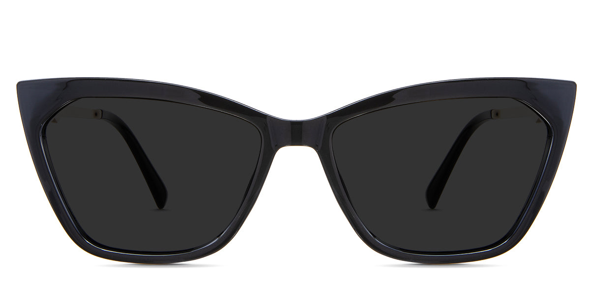 Malia black tinted Standard Solid in the Lasius variant - it's a cat-eye shape frame with a U-shaped nose bridge and has a metal arm and acetate tips.
