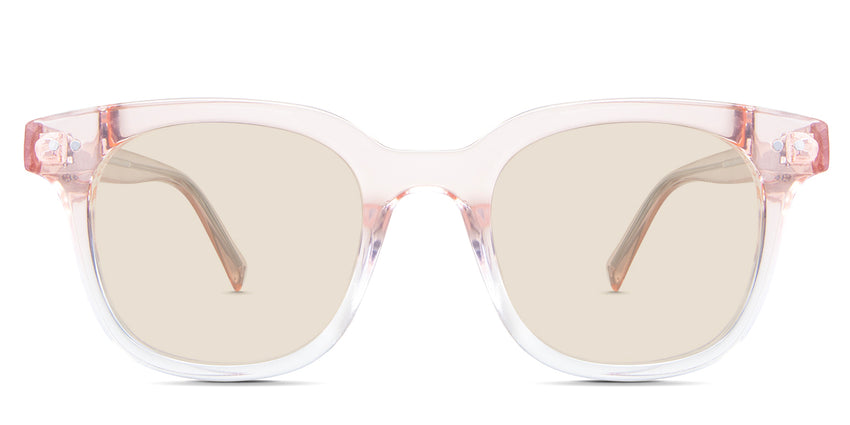 Sailor Beige Tinted Solid in the Tulip variant - it's a square frame with a curvy edge, a high nose bridge, and a visible wire core in the arm.