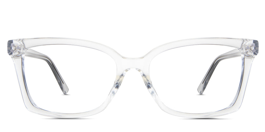 Stella eyeglasses in the crystal variant - it's an acetate frame with three round rivets embossed at the end piece.