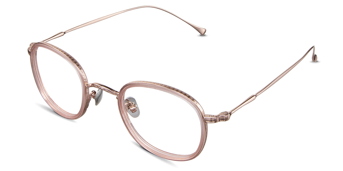 Tansi eyeglasses in the melon variant - have a chain-patterned outer side of the rim.