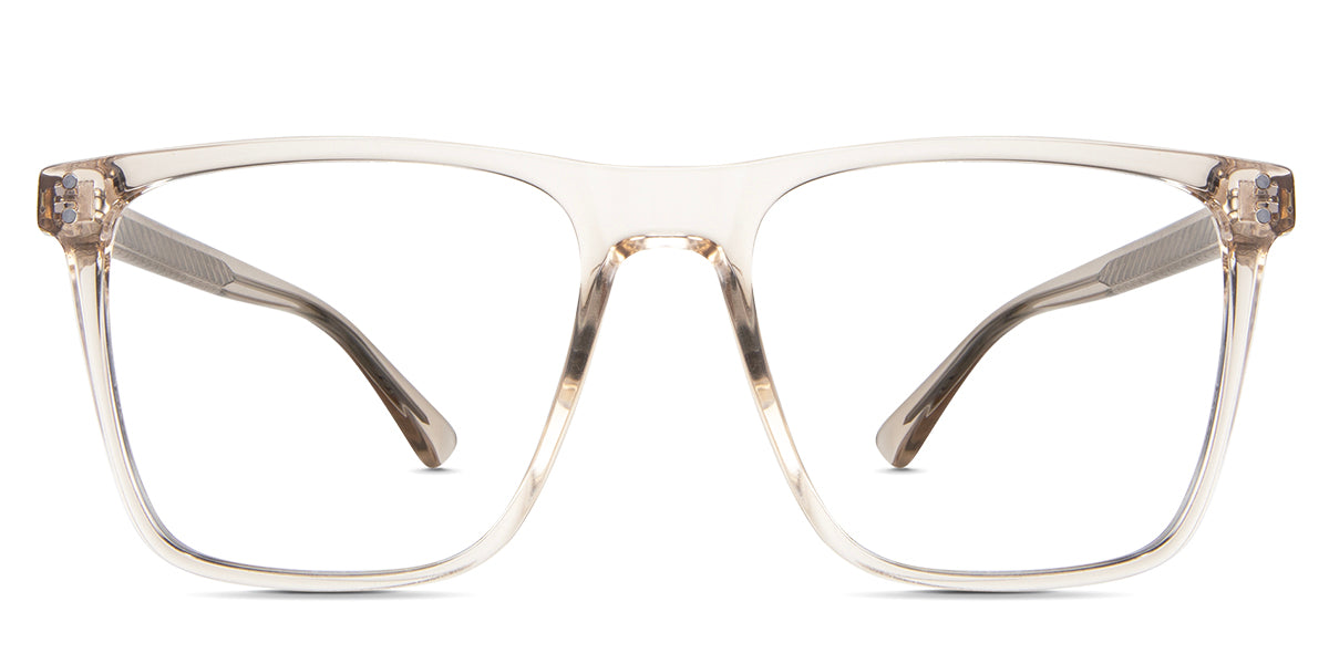 Zayden eyeglasses in the pyrite variant - it's a square frame with two silver embosses on the end piece.